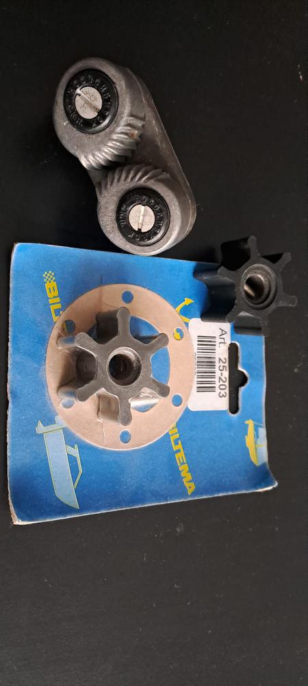 Water pump impeller and rope clutch.