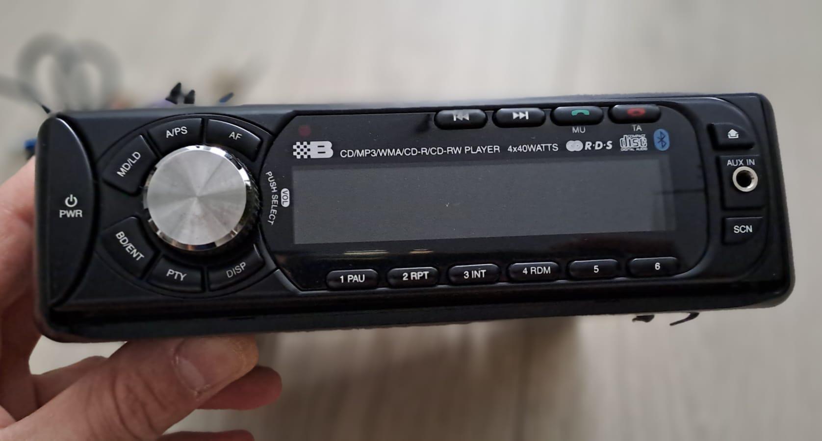 Stereo system: Radio + CD player + 2 speakers