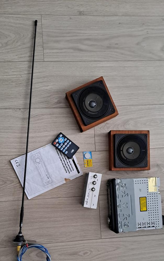 Stereo system: Radio + CD player + 2 speakers